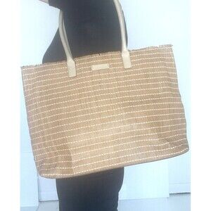 Vintage Calvin Klein Collection LEATHER fringe woven bag. Super cute for summer!
